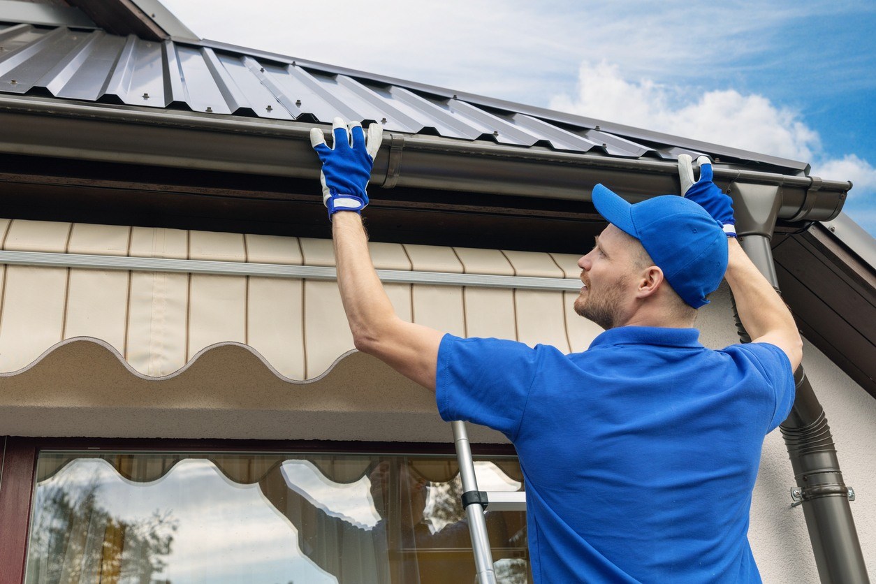 person fixing a house